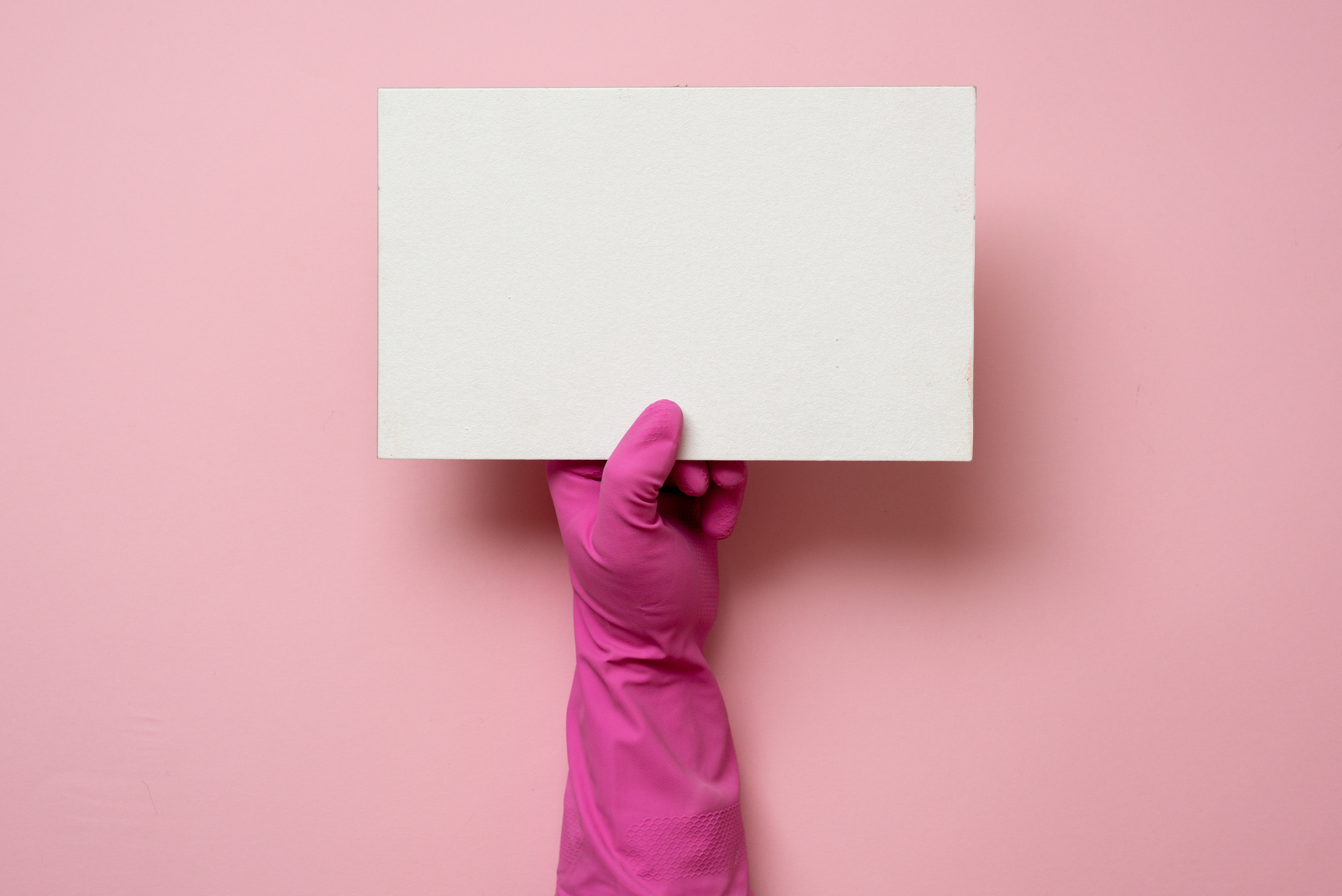 On a Pink Background, Cleaning Gloves, Place for Writing Text, Copy Space